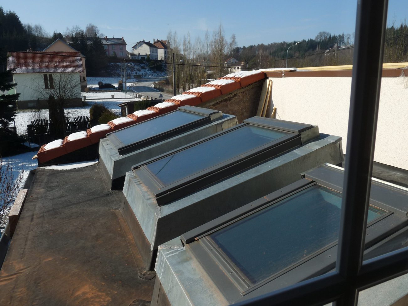 Habillage zinc autour de fenêtres de toit